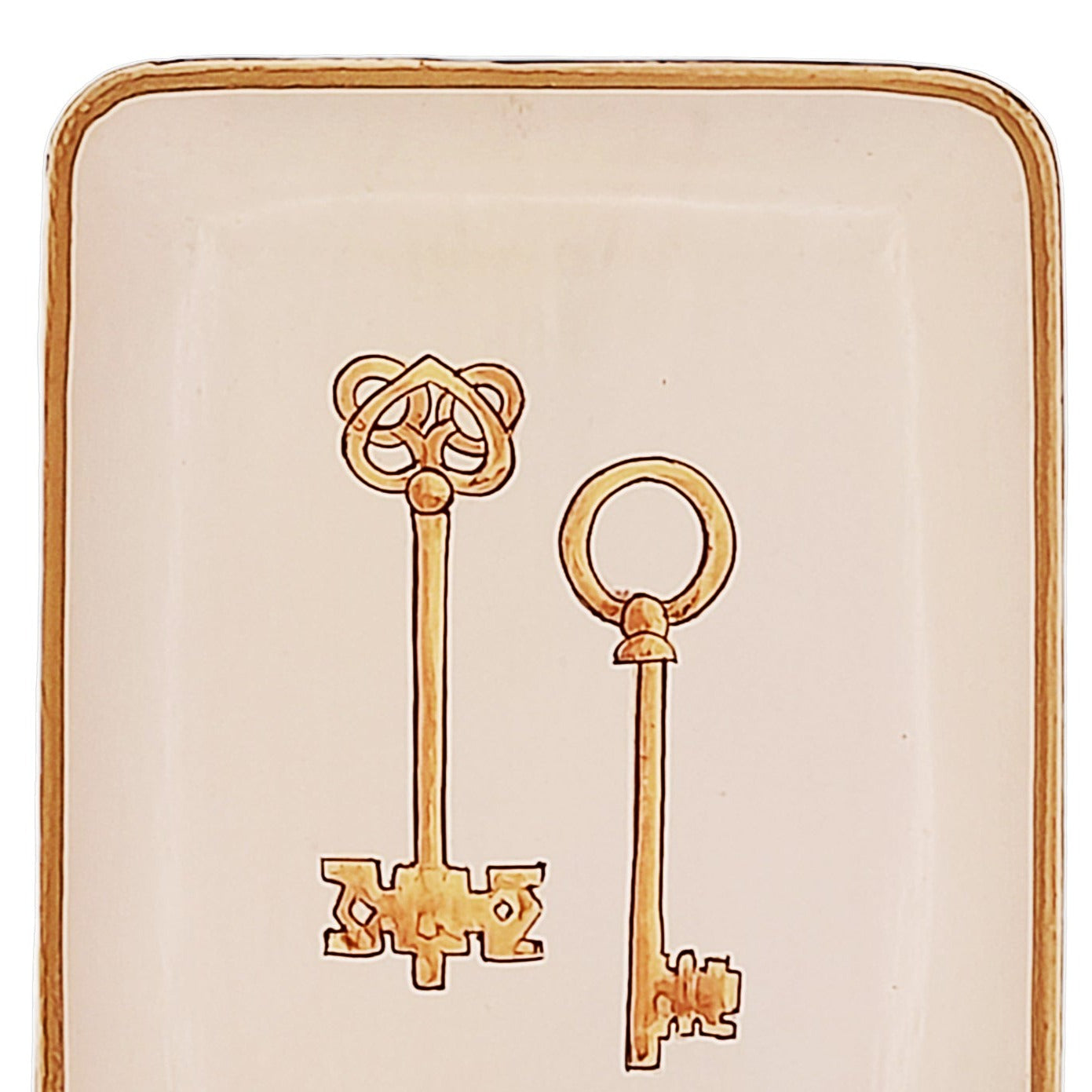 Creme dienblad met gouden sleutels